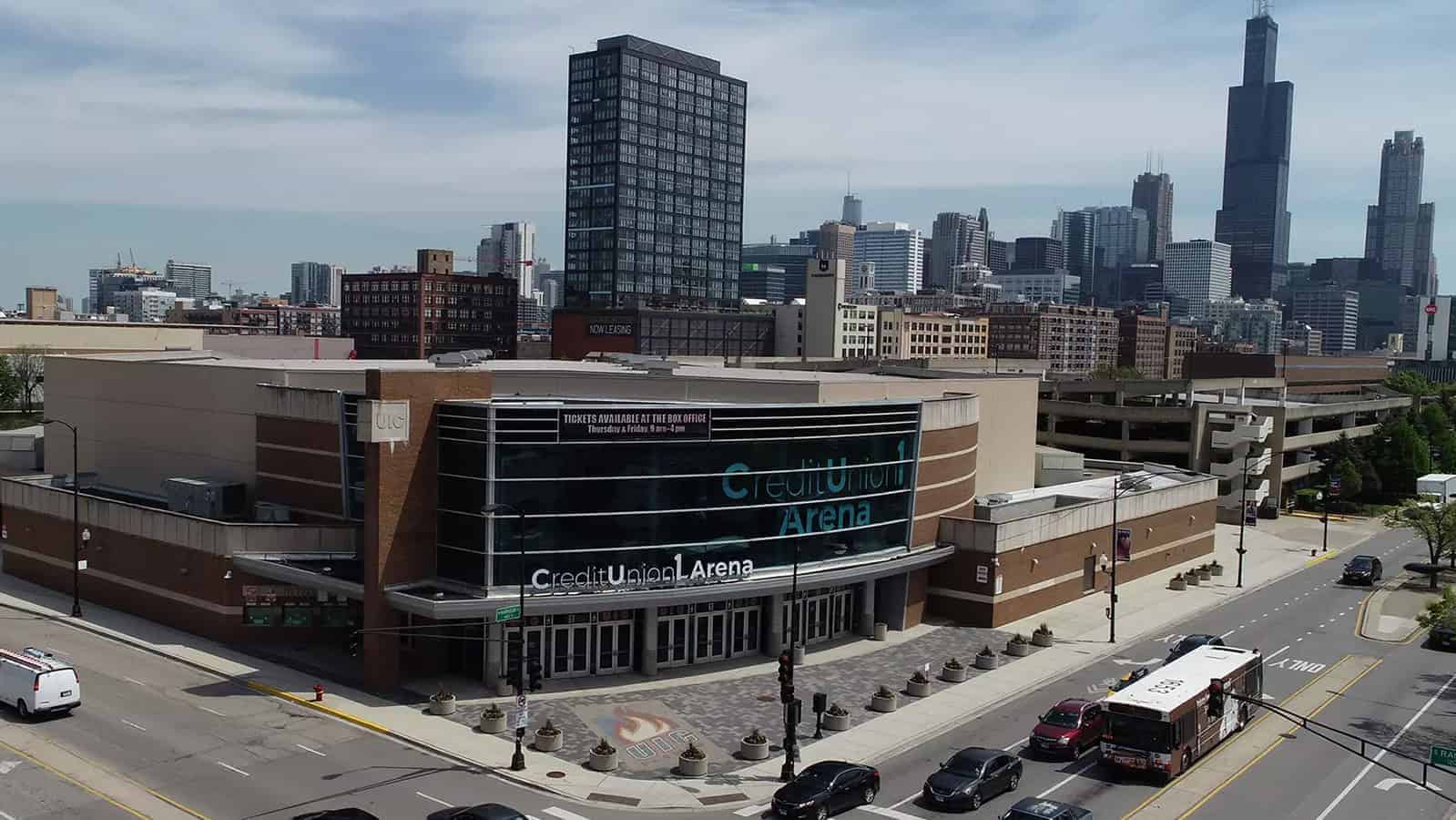 View of Credit Union 1 Arena with Chicago skyline in background.